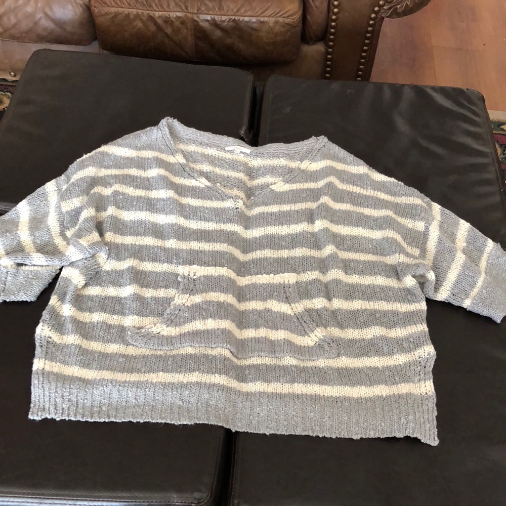 Cute distressed oversized pocket detail sweater
